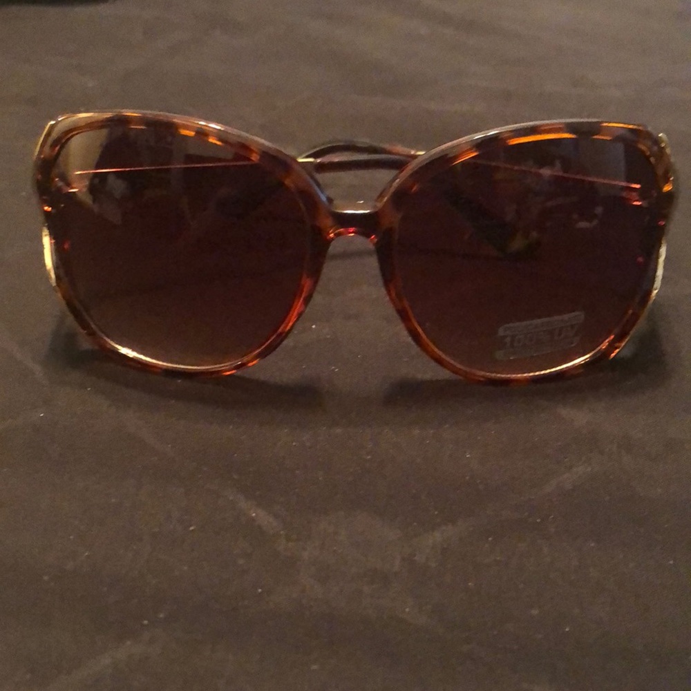 Brown and gold frame sunglasses
